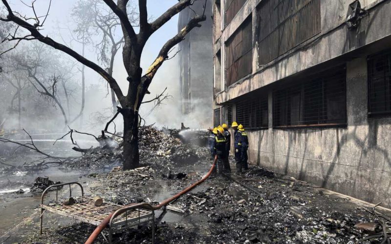 Firefighters work at the site of an airplane that crashed in India's northwestern city of Ahmedabad in Gujarat state, Thursday, June 12, 2025. (AP Photo/Ajit Solanki)