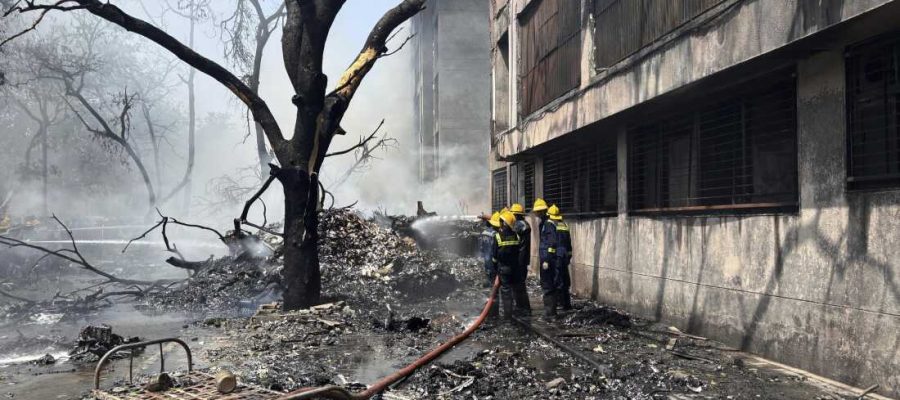 Firefighters work at the site of an airplane that crashed in India's northwestern city of Ahmedabad in Gujarat state, Thursday, June 12, 2025. (AP Photo/Ajit Solanki)